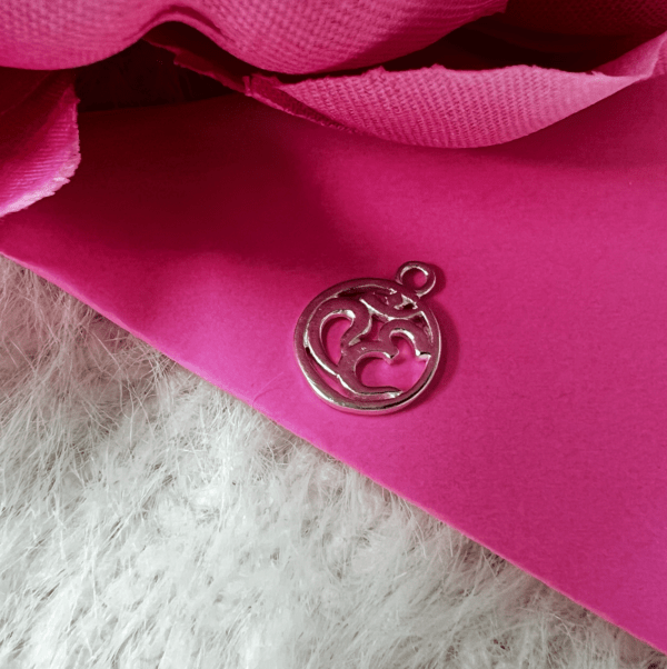 sacred ohm charm