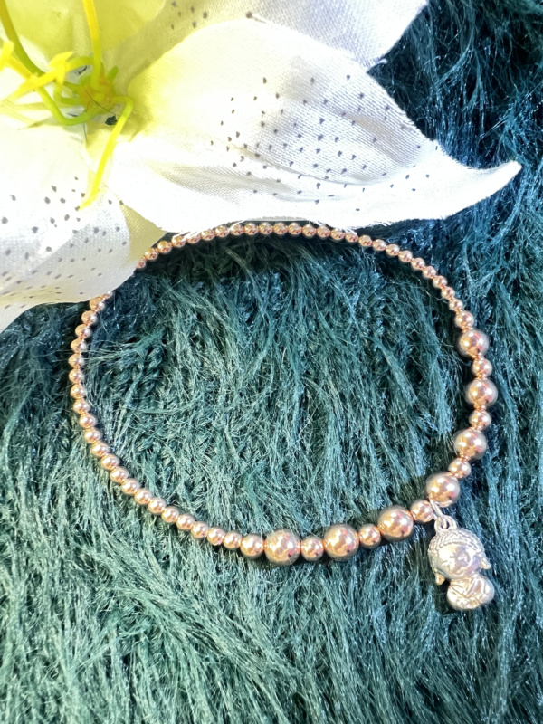 wisdom keeper buddha charm