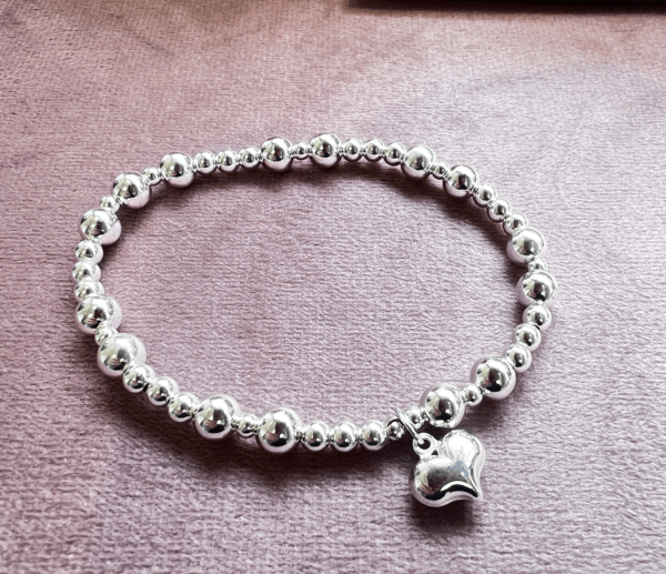 silver embrace heart bracelet
